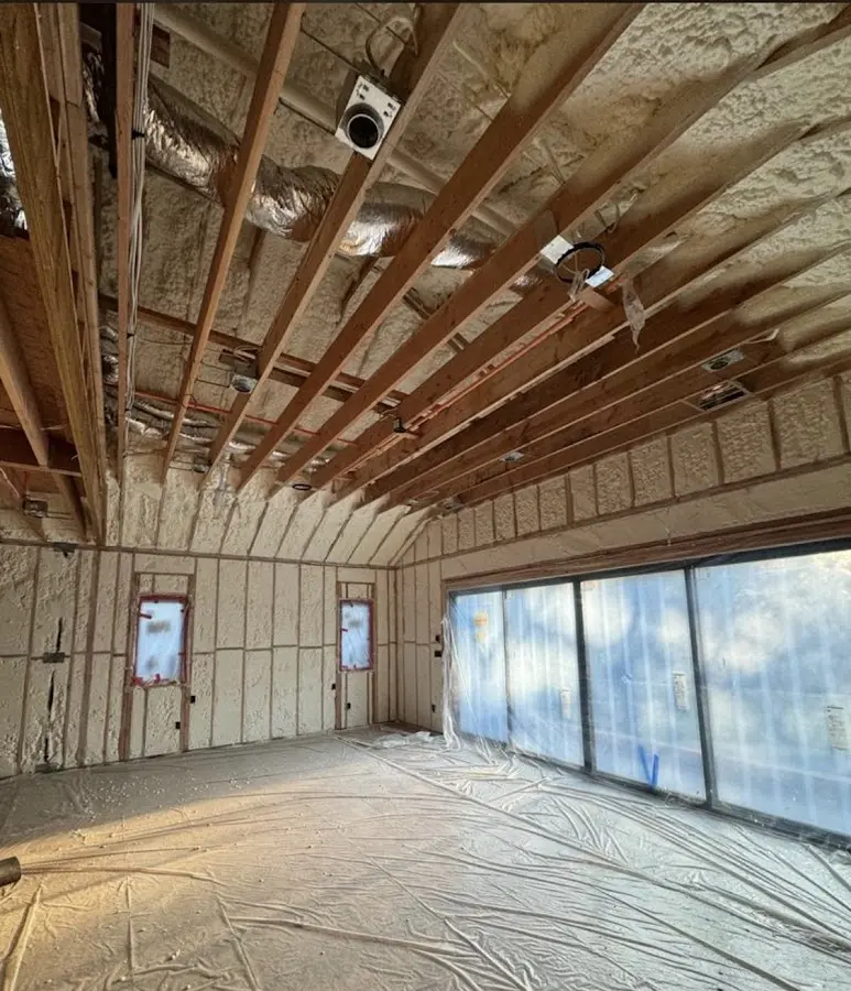 Interior walls and ceiling insulated with spray foam during new construction in South Plainfield